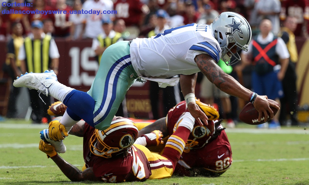 LANDOVER, MD - SEPTEMBER 18: Quarterback Dak Prescott #4 of the Dallas Cowboys scores a third quarter touchdown past inside linebacker Mason Foster #54 of the Washington Redskins at FedExField on September 18, 2016 in Landover, Maryland. (Photo by Rob Carr/Getty Images)