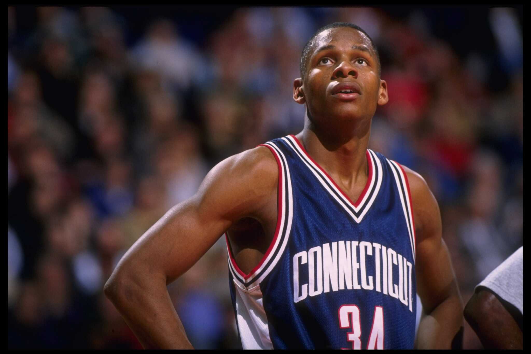 19 Feb 1996: Guard Ray Allen #34 of the Connecticut Huskies pauses on the court during a break in the action against the Georgetown Hoyas in this Big East match-up at the USAir Arena in Washington, D.C. Georgetown defeated UConn 77-65.