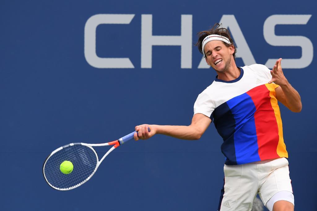 Austria's Dominic Thiem returns the ball to France's Adrian Mannarino during their Qualifying Men's Singles match at the 2017 US Open Tennis Tournament on September 2nd, 2017 in New York. / AFP PHOTO / Timothy A. CLARY
