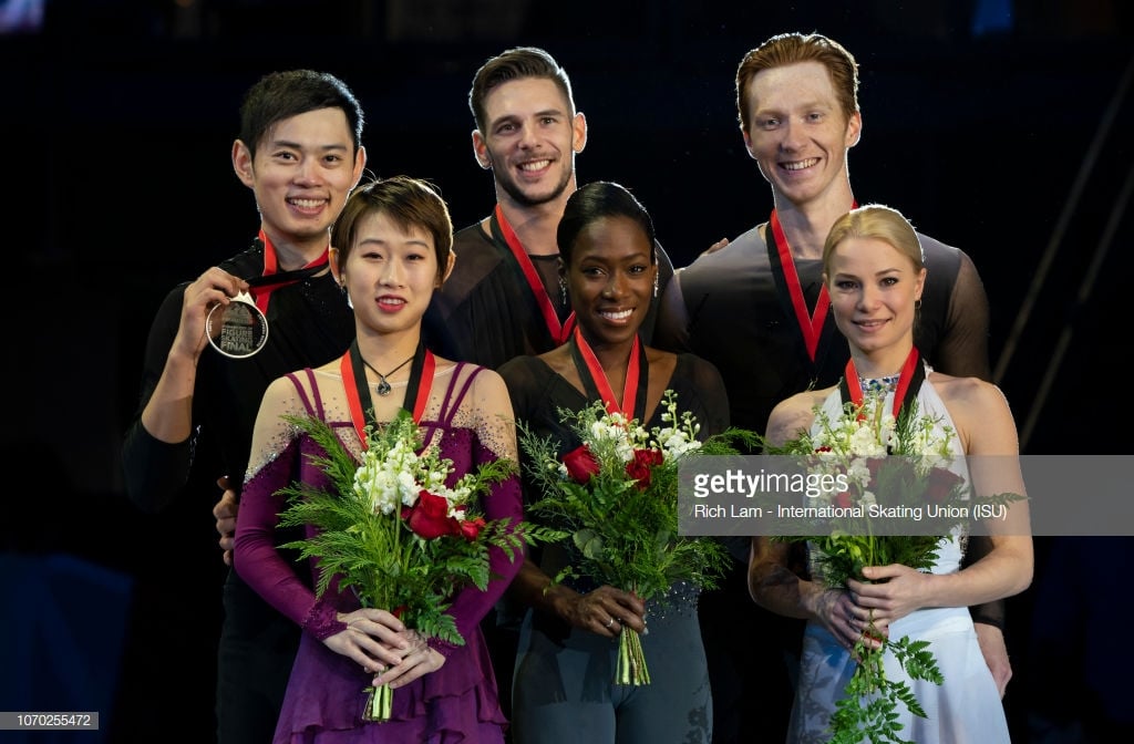 VANCOUVER, BC - DECEMBER 8: First place Vanessa James and Morgan Cipres of France (middle), second place Cheng Peng and Yang Jin of China (left) and third place Evgenia Tarasova and Vladimir Morozov of Russia pose for photos during the victory ceremony for the the Pairs Competition on December, 8, 2018 at the ISU Junior & Senior Grand Prix of Figure Skating Final in Vancouver, British Columbia, Canada.  (Photo by Rich Lam - International Skating Union (ISU))